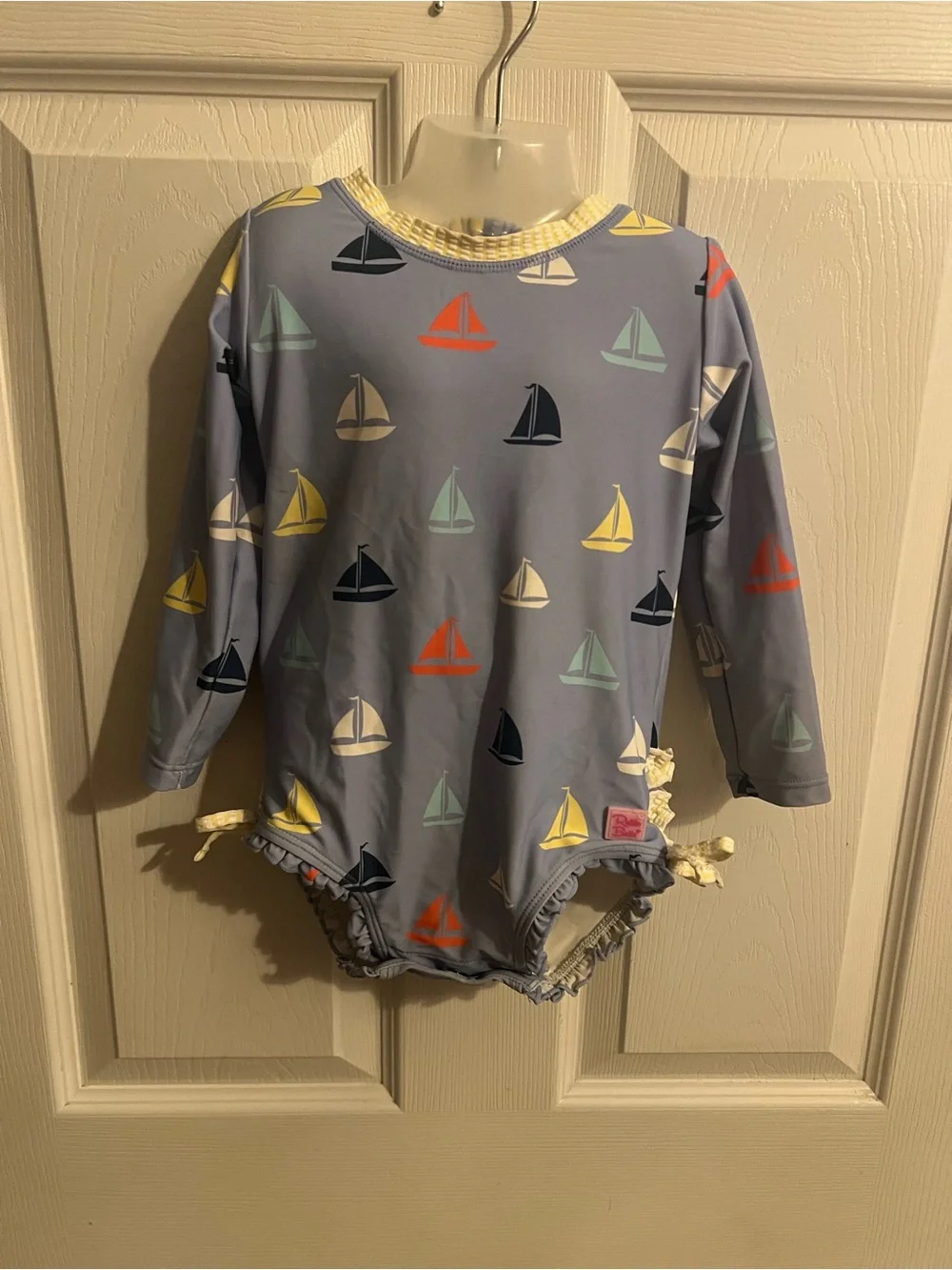 Ruffle Butts Light Blue Sailboat Swimsuit with Multi-Color 2T.
